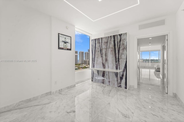 400 Sunny Isles Blvd Unit 2008, Sunny Isles Beach, FL 33160 - empty room with marble tiled flooring and a view of skyline