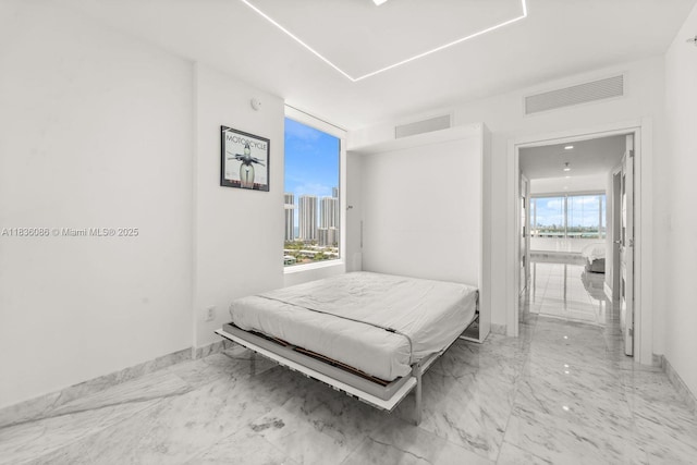 400 Sunny Isles Blvd Unit 2008, Sunny Isles Beach, FL 33160 - bedroom featuring multiple windows and marble finish floors