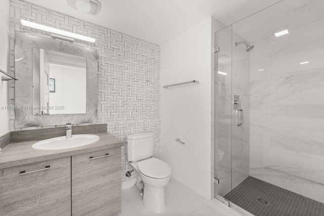 400 Sunny Isles Blvd Unit 2008, Sunny Isles Beach, FL 33160 - bathroom featuring a marble finish shower, vanity, and tile walls