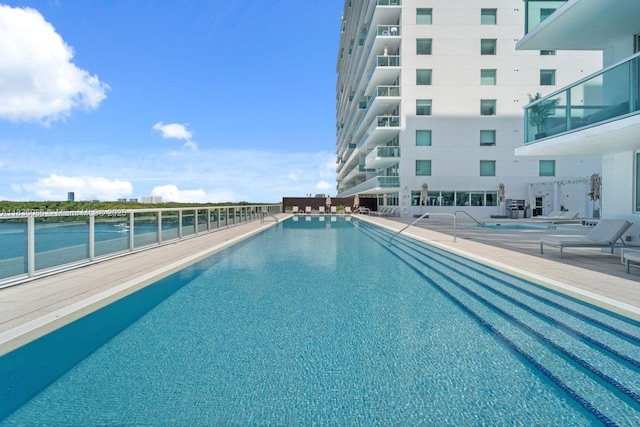 400 Sunny Isles Blvd Unit 2008, Sunny Isles Beach, FL 33160 - community pool featuring a water view and a patio area