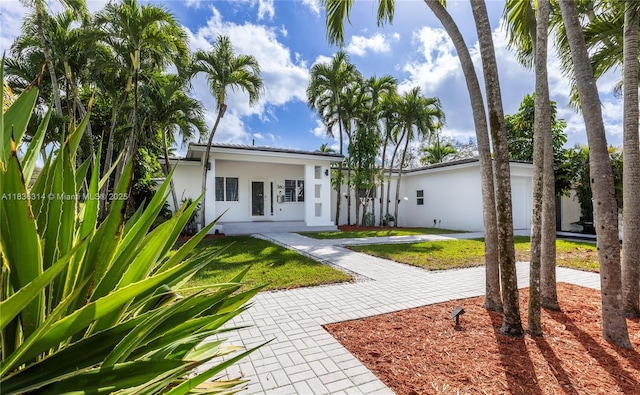 380 Morningside Dr, Miami Springs, FL 33166 - view of front facade featuring stucco siding
