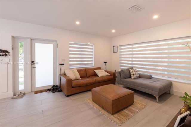380 Morningside Dr, Miami Springs, FL 33166 - living room with healthy amount of natural light and recessed lighting