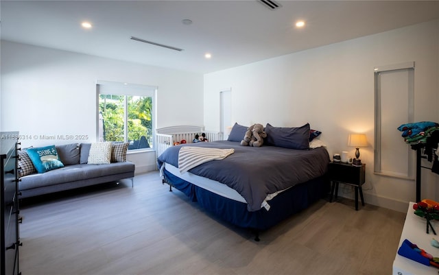 380 Morningside Dr, Miami Springs, FL 33166 - bedroom featuring wood finished floors and recessed lighting