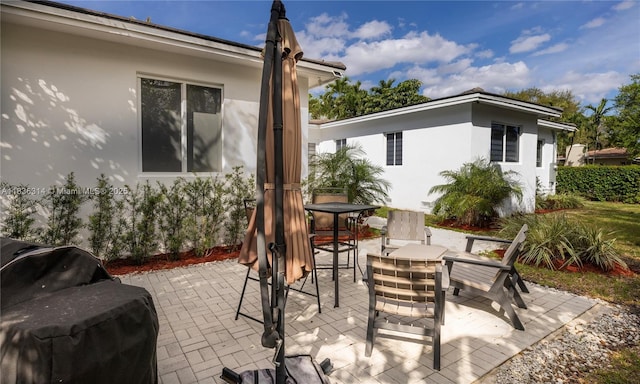 380 Morningside Dr, Miami Springs, FL 33166 - view of patio featuring outdoor dining area