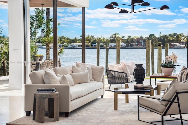 1510 Stillwater Dr, Miami Beach, FL 33141 - sunroom featuring a chandelier and a water view