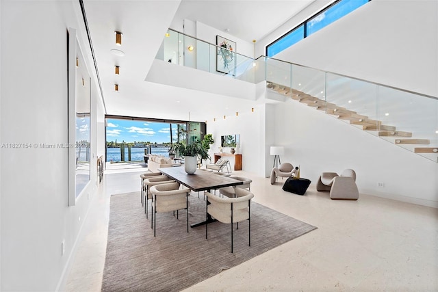1510 Stillwater Dr, Miami Beach, FL 33141 - dining room featuring plenty of natural light and a towering ceiling