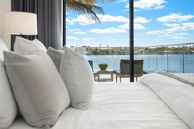 1510 Stillwater Dr, Miami Beach, FL 33141 - bedroom featuring a water view