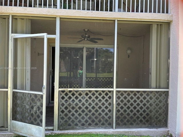 8735 Ramblewood Dr Unit 114, Coral Springs, FL 33071 - property entrance with a ceiling fan and stucco siding