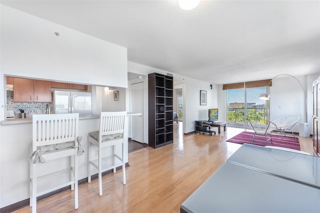 816 NW 11th St Unit 1101, Miami, FL 33136 - living area featuring light wood-style floors