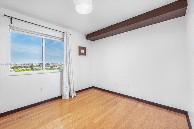 816 NW 11th St Unit 1101, Miami, FL 33136 - empty room with light wood finished floors and baseboards