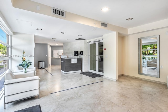 816 NW 11th St Unit 1101, Miami, FL 33136 - reception area featuring recessed lighting