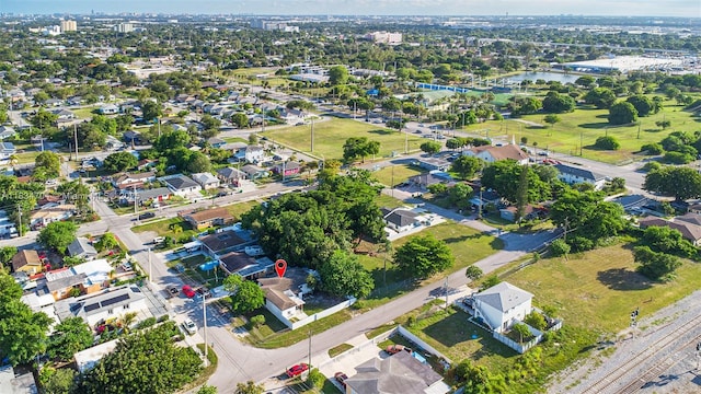 7190 NW 21st Ave, Miami, FL 33147 - aerial overview of property's location with a large body of water and nearby suburban area