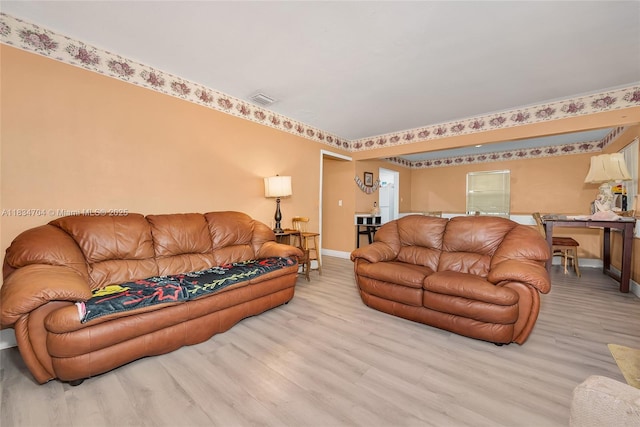 7190 NW 21st Ave, Miami, FL 33147 - living room with wood finished floors and baseboards