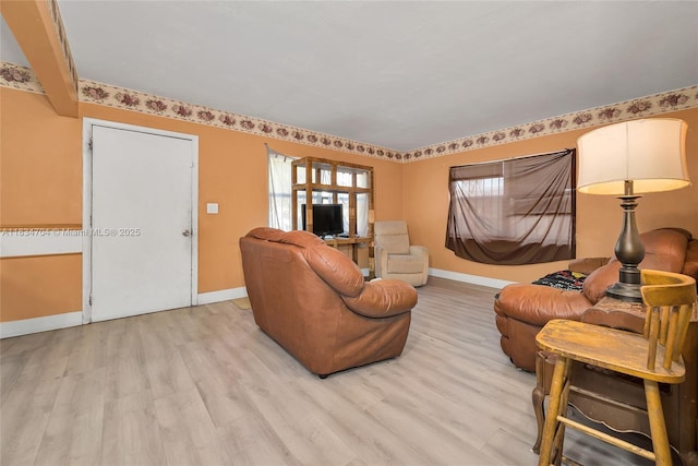 7190 NW 21st Ave, Miami, FL 33147 - living room with baseboards and light wood-type flooring
