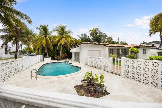 811 SW 25th Rd, Miami, FL 33129 - view of swimming pool with a patio area
