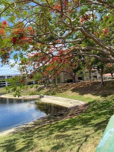 1865 Palm Cove Blvd Unit 9-306, Delray Beach, FL 33445 - view of home's community featuring a water view and a yard
