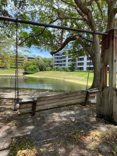 1865 Palm Cove Blvd Unit 9-306, Delray Beach, FL 33445 - surrounding community with a water view