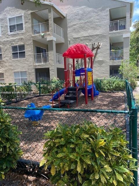 1865 Palm Cove Blvd Unit 9-306, Delray Beach, FL 33445 - view of community jungle gym