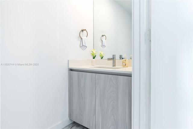 3131 NE 7th Ave Unit 1202, Miami, FL 33137 - bathroom featuring vanity and marble finish flooring