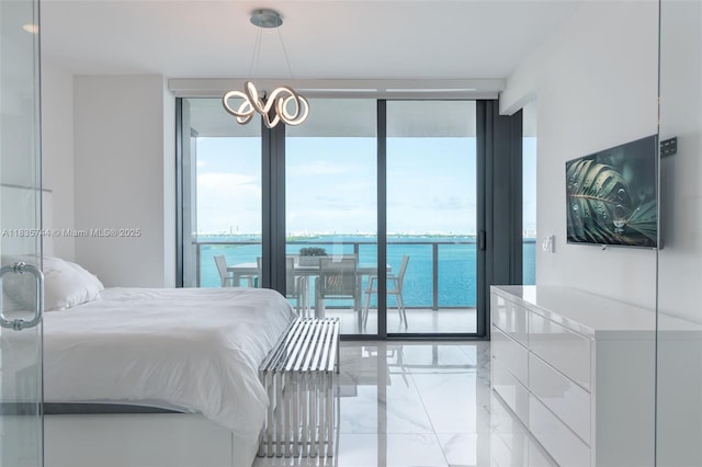3131 NE 7th Ave Unit 1202, Miami, FL 33137 - bedroom with expansive windows, light marble finish flooring, access to outside, a water view, and a chandelier