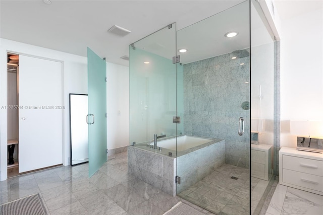 3131 NE 7th Ave Unit 1202, Miami, FL 33137 - bathroom featuring a shower stall, recessed lighting, a bath, and marble finish flooring