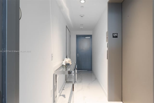 3131 NE 7th Ave Unit 1202, Miami, FL 33137 - hall with marble look tile flooring and elevator