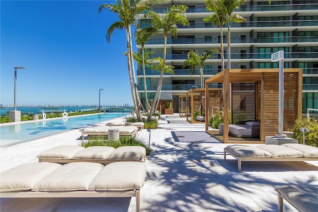 3131 NE 7th Ave Unit 1202, Miami, FL 33137 - view of patio with a community pool