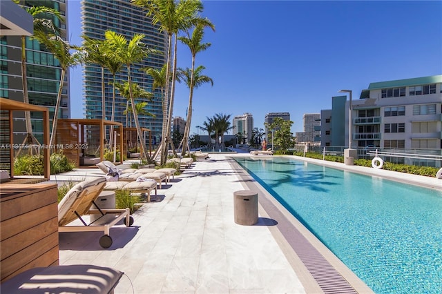 3131 NE 7th Ave Unit 1202, Miami, FL 33137 - community pool featuring a patio