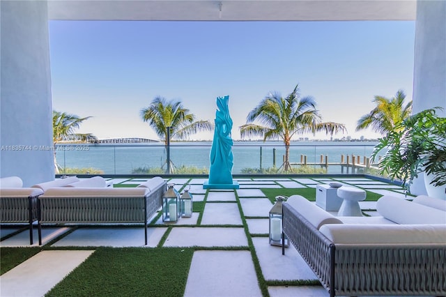 3131 NE 7th Ave Unit 1202, Miami, FL 33137 - view of patio with a water view and an outdoor living space