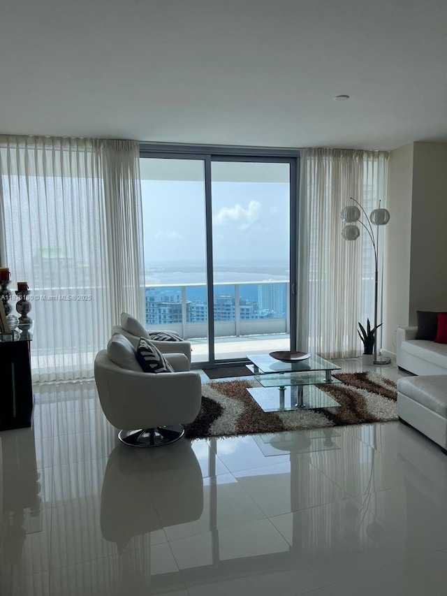 200 Biscayne Boulevard Way Unit 4603, Miami, FL 33131 - living area featuring floor to ceiling windows and tile patterned flooring