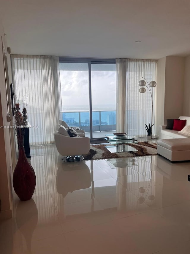 200 Biscayne Boulevard Way Unit 4603, Miami, FL 33131 - living area with tile patterned floors and a wall of windows
