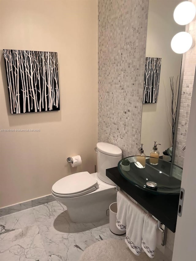 200 Biscayne Boulevard Way Unit 4603, Miami, FL 33131 - bathroom featuring marble look tile flooring and vanity