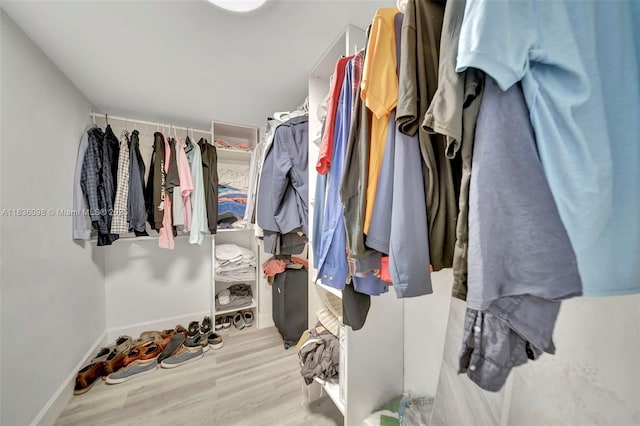 5005 Collins Ave Unit 815, Miami Beach, FL 33140 - walk in closet with wood finished floors