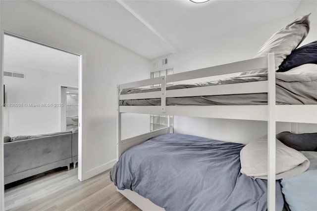 5005 Collins Ave Unit 815, Miami Beach, FL 33140 - bedroom with light wood-style floors and baseboards