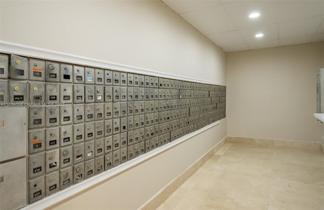 5005 Collins Ave Unit 815, Miami Beach, FL 33140 - view of property's community featuring mail area, recessed lighting, and a paneled ceiling