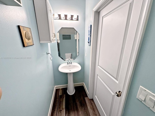 4126 Cascada Cir, Cooper City, FL 33024 - half bathroom with wood finished floors and baseboards