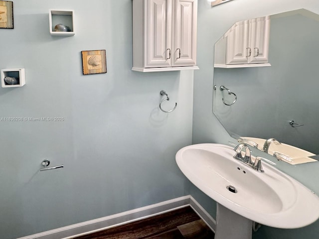 4126 Cascada Cir, Cooper City, FL 33024 - bathroom featuring a sink and wood finished floors