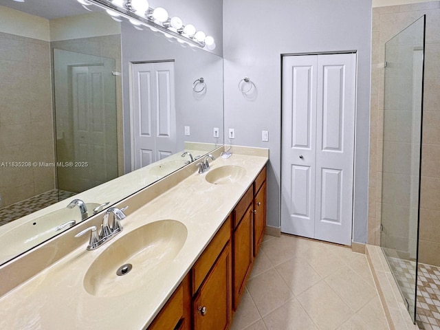 4126 Cascada Cir, Cooper City, FL 33024 - bathroom with double vanity, tile patterned floors, and tiled shower