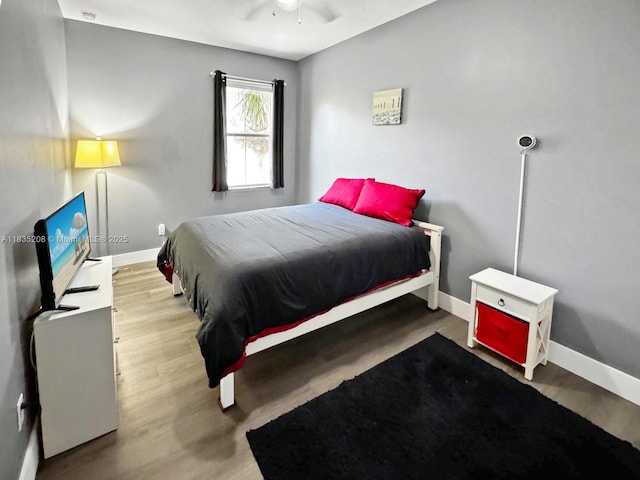 4126 Cascada Cir, Cooper City, FL 33024 - bedroom with baseboards and wood finished floors