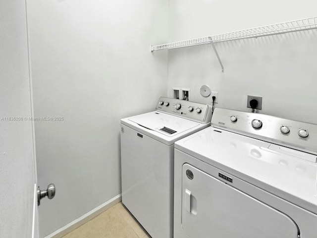 4126 Cascada Cir, Cooper City, FL 33024 - laundry area with separate washer and dryer and light tile patterned floors