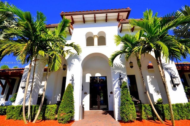 4126 Cascada Cir, Cooper City, FL 33024 - mediterranean / spanish-style home featuring stucco siding and french doors