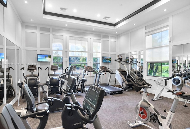 4126 Cascada Cir, Cooper City, FL 33024 - workout area featuring a decorative wall, a towering ceiling, and recessed lighting