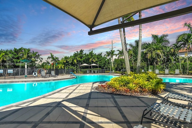 4126 Cascada Cir, Cooper City, FL 33024 - community pool featuring a patio