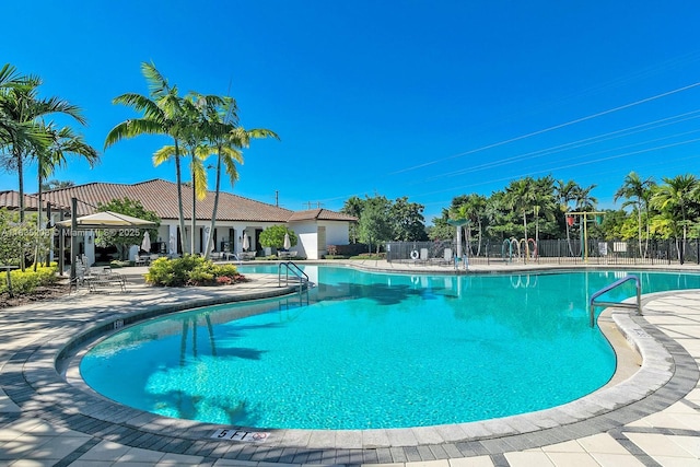 4126 Cascada Cir, Cooper City, FL 33024 - community pool featuring a gazebo and a patio