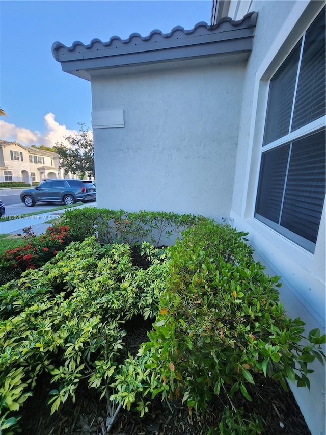 2693 SE 19th St, Homestead, FL 33035 - view of side of home featuring stucco siding