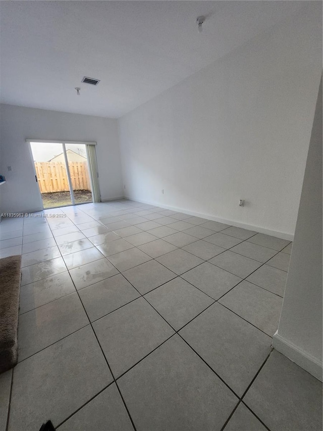 2693 SE 19th St, Homestead, FL 33035 - empty room with tile patterned flooring and baseboards