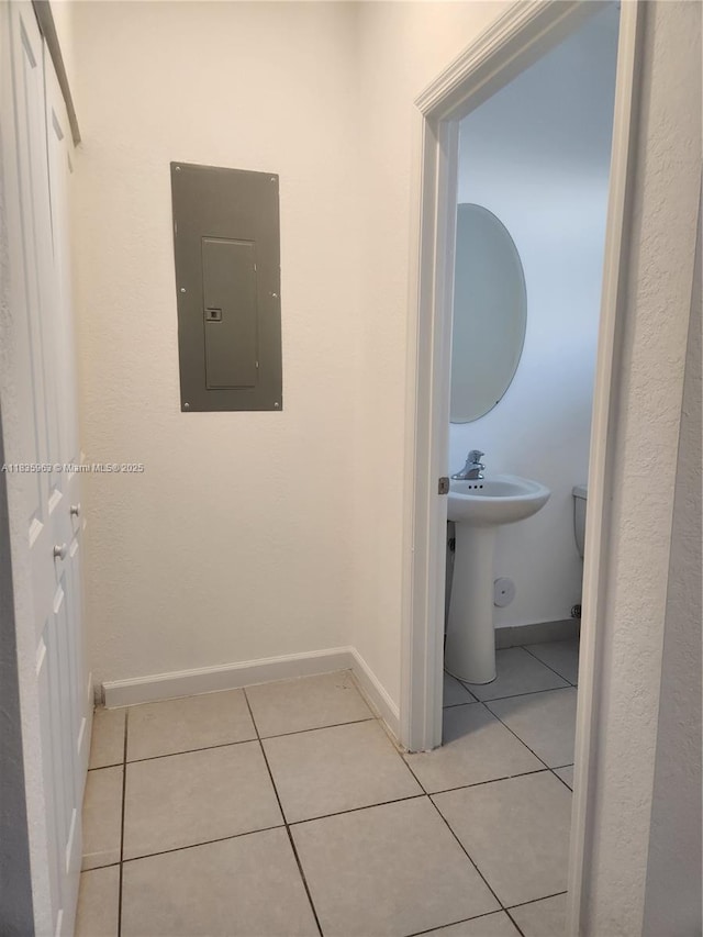 2693 SE 19th St, Homestead, FL 33035 - bathroom featuring electric panel and tile patterned floors