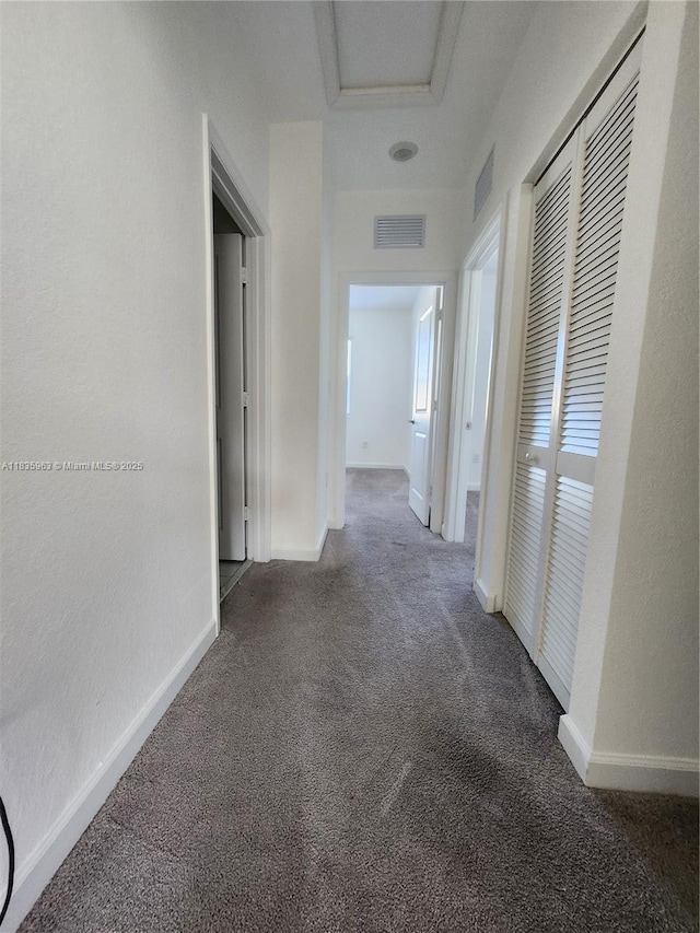 2693 SE 19th St, Homestead, FL 33035 - hallway featuring carpet floors and attic access