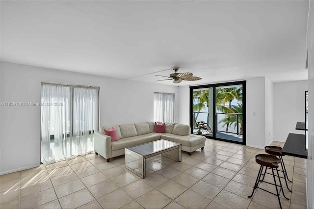 1600 S Bayshore Ln Unit 3A, Coconut Grove, FL 33133 - living room featuring a ceiling fan and light tile patterned floors