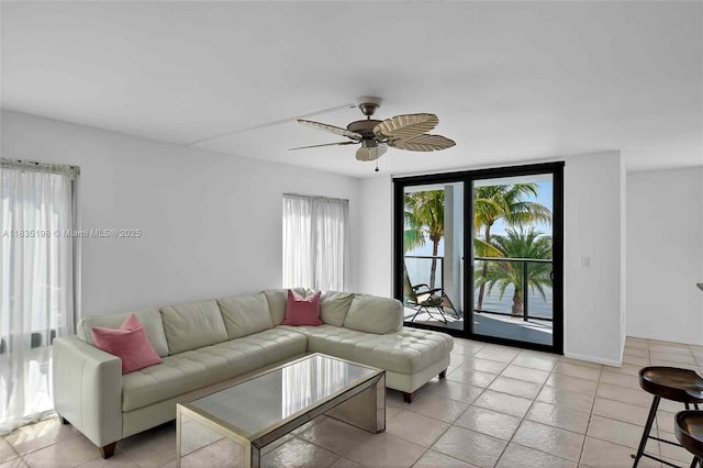 1600 S Bayshore Ln Unit 3A, Coconut Grove, FL 33133 - living area featuring light tile patterned floors and ceiling fan